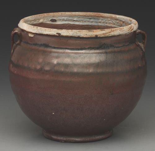 图9 元代当阳峪窑酱釉双系罐 焦作市中站区元代靳德茂墓道出土 图9 元代当阳峪窑酱釉双系罐 焦作市中站区元代靳德茂墓道出土