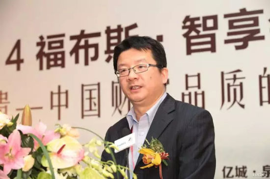 图为为资深媒体人周健工。