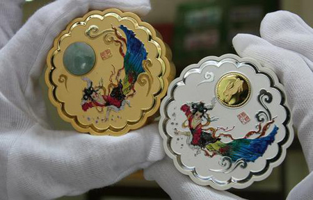 奥运首款金镶玉月饼纪念章上市(图)_钱币_新浪财经_新浪网