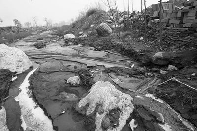 河南整治环境污染调查:违法企业受重点保护