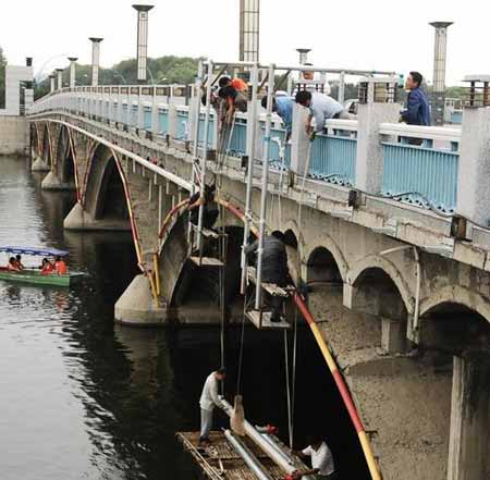 长春市南湖大桥彩色瀑布喷泉正式开工建设(图