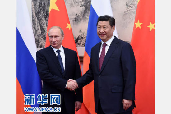 习近平会见俄罗斯总统普京