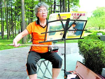 图文:一曲《小河淌水》诉不尽50年衷情