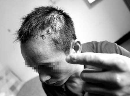 凶徒夜宿小店 暴打老板强奸老板娘(图)