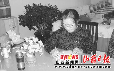 古稀农妇写村志(图)