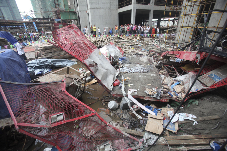 中国日报一周图片精选-武汉工地电梯坠落19人
