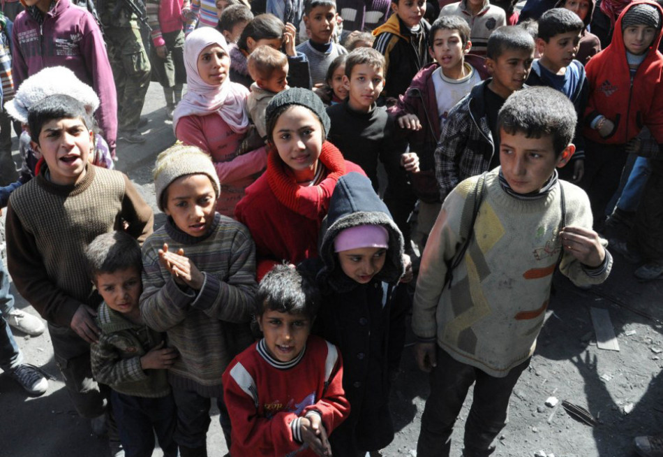 联合国在叙利亚发放救济食品难民蜂拥而至