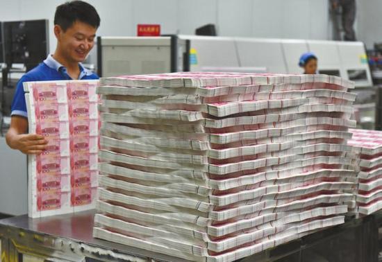 揭秘人民币完整制作过程现场组图：从白纸到钞票需1个月