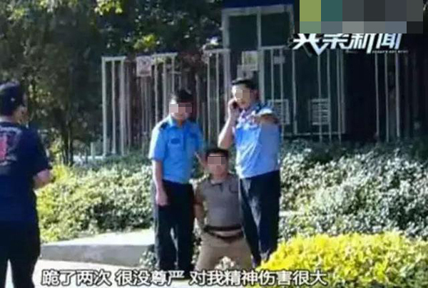 男子随手拍交警违章 被当场摔跪在马路中两次(图)