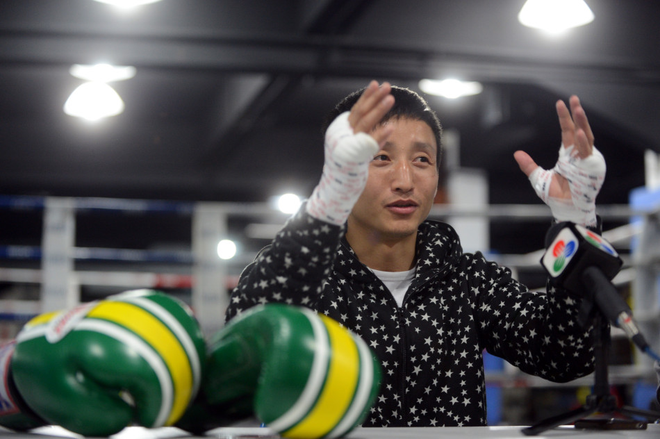 邹市明老婆_邹市明职业拳赛收入