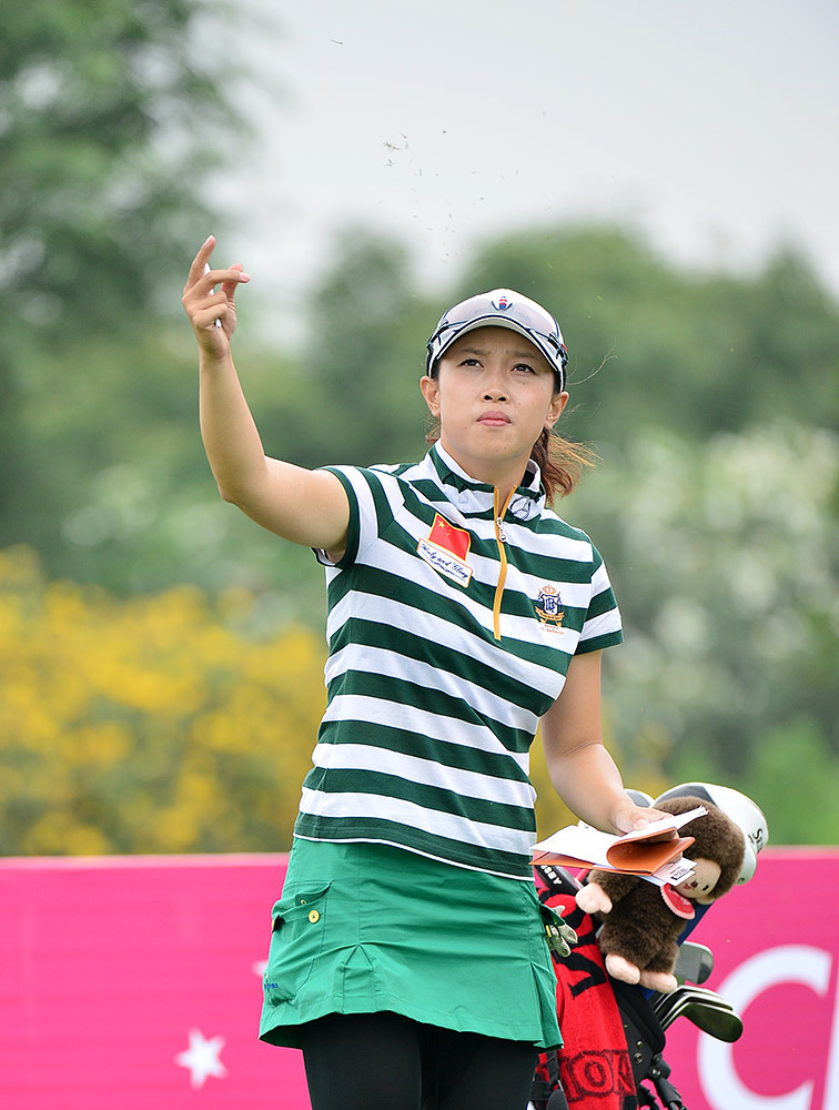 黎佳韵在比赛中优雅挥杆，动作流畅而充满力量，展现出国家队队长的扎实功底与领袖气质。