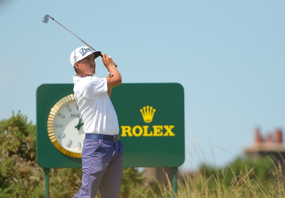 瑞奇·福勒与塞尔吉奥·加西亚在比赛中并肩前行，既是激烈的竞争对手，也是共同挑战顶级赛场的同行者