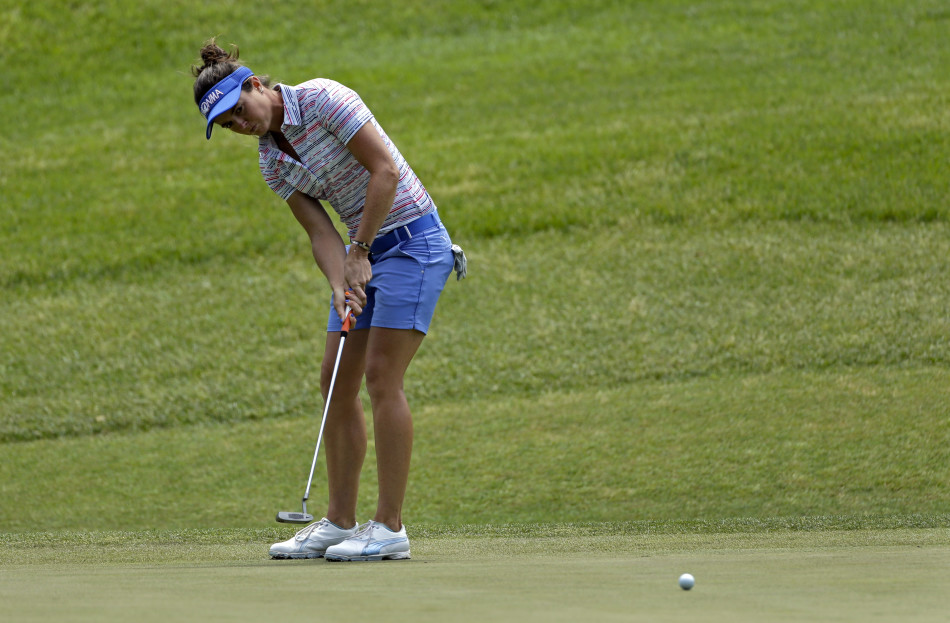 夏安-伍兹在赛场上凝神准备，继承了家族特有的专注与对胜利的渴望