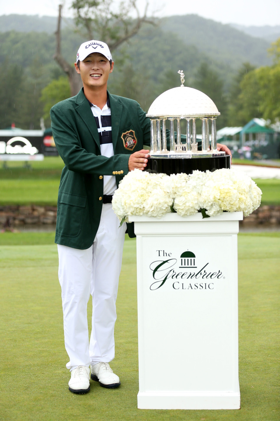 绿蔷薇精英赛决赛轮，李真明在球道上稳健挥杆，姿态优雅而有力