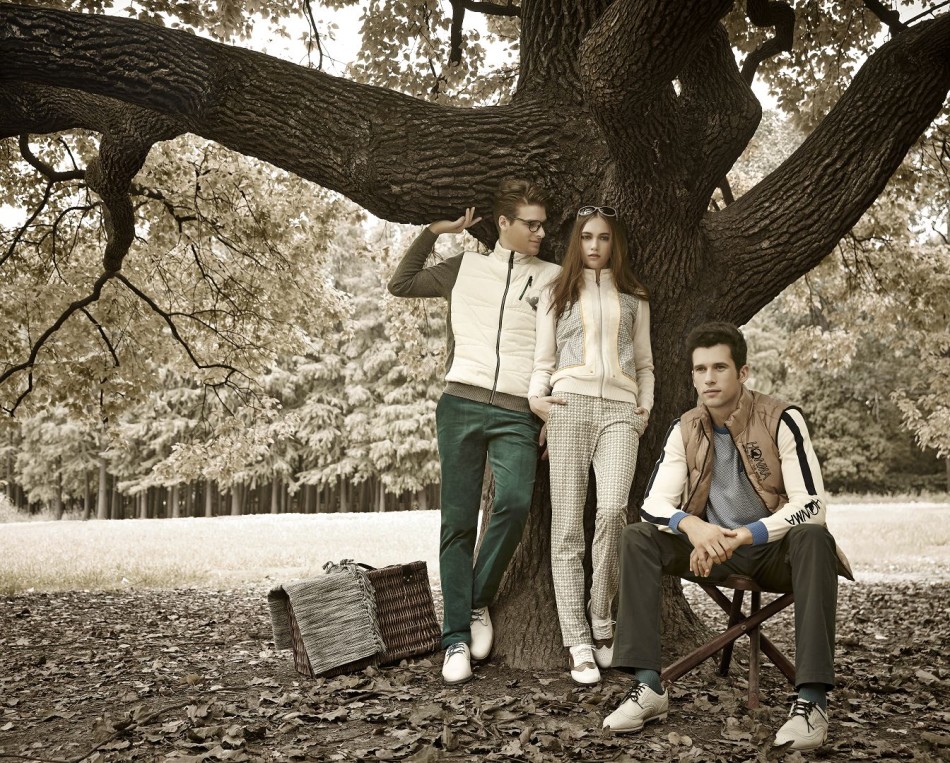 系列服饰细节特写如艺术品陈列，精密缝线在灯光下如琴弦般排列，功能性面料呈现出如油画笔触般的质感层次