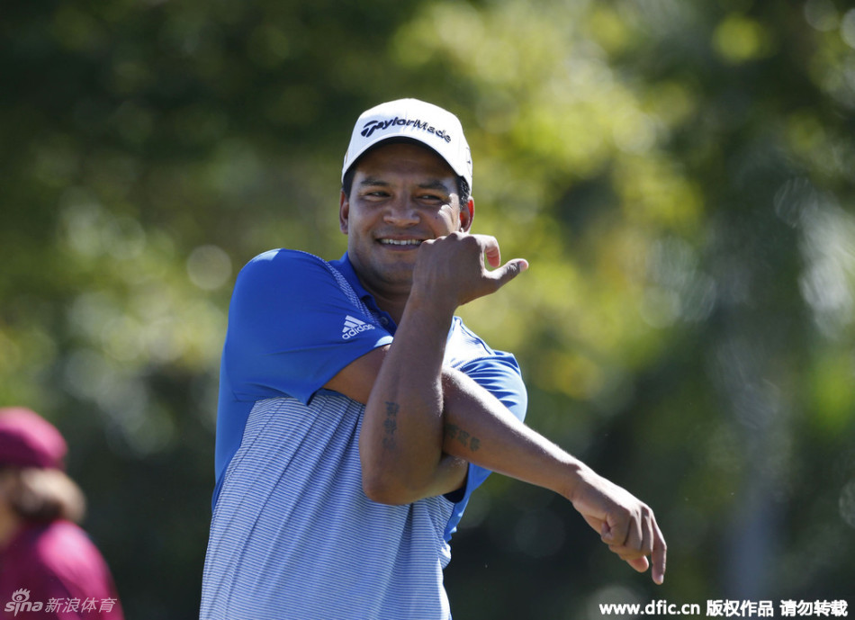 加拿大球手格兰姆·德莱特面带微笑，其浓密的络腮胡与自信神态相得益彰，展现出高尔夫球手独特的个人风格与魅力。