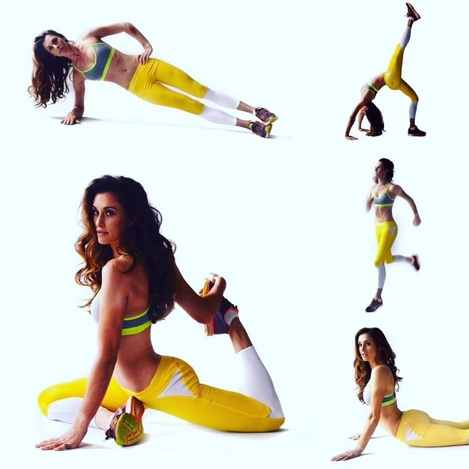 健身房中的维琴诺娃正在进行瑜伽训练,身体舒展柔韧,神情平静专注,展现力量与柔美的平衡。