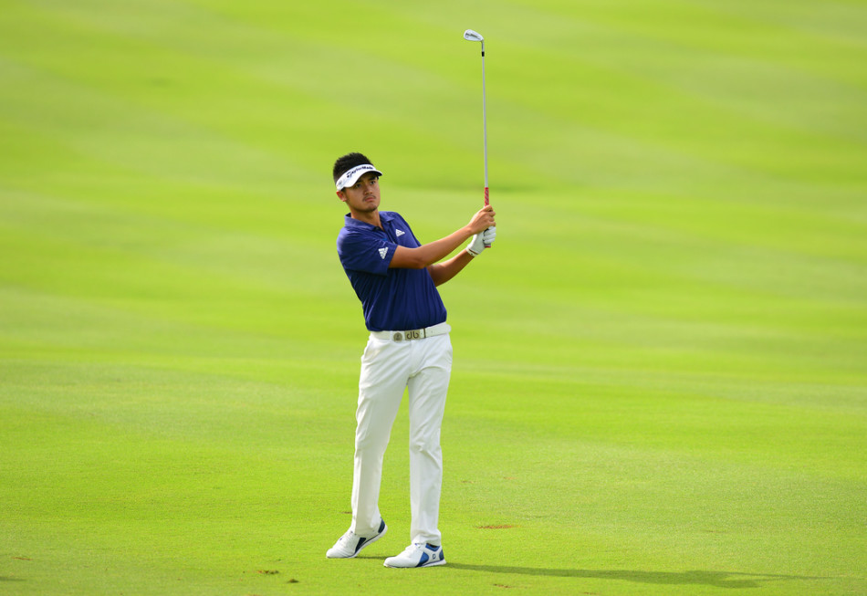 日本选手川村昌弘在沙坑中冷静救球，展现扎实的基本功