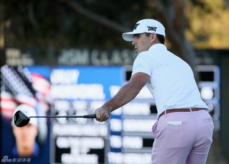 比利·霍雪尔在加洞赛中准备开球，神情专注志在必得