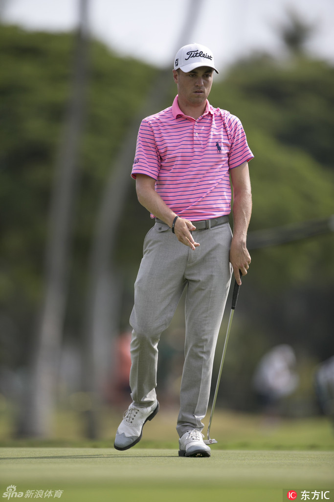 加里·伍德兰德正准备开球，其标志性的强力挥杆姿势充满了力量感。