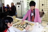 华学明指导棋迷