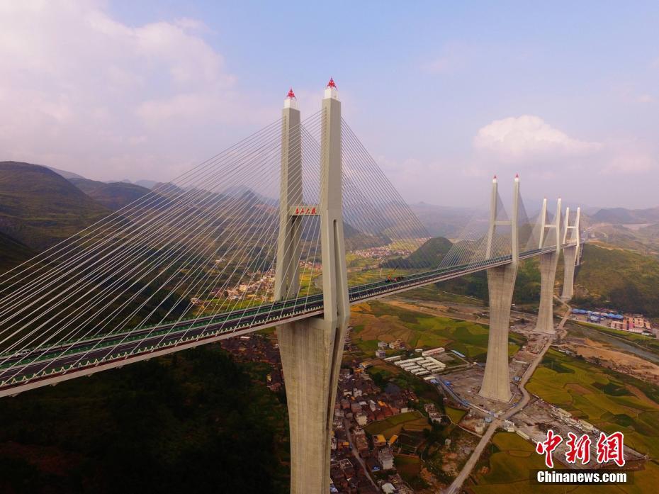 包诗雨安河桥吉他谱-主梁安装下拉抗风索,并在梁端安装横桥向电涡流调谐质量阻尼器的抗