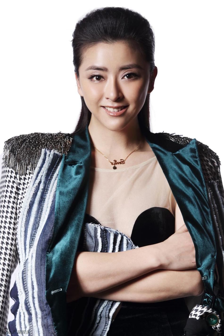 组图:黄小蕾与戴军拍写真飒爽干练_高清图集_新浪网