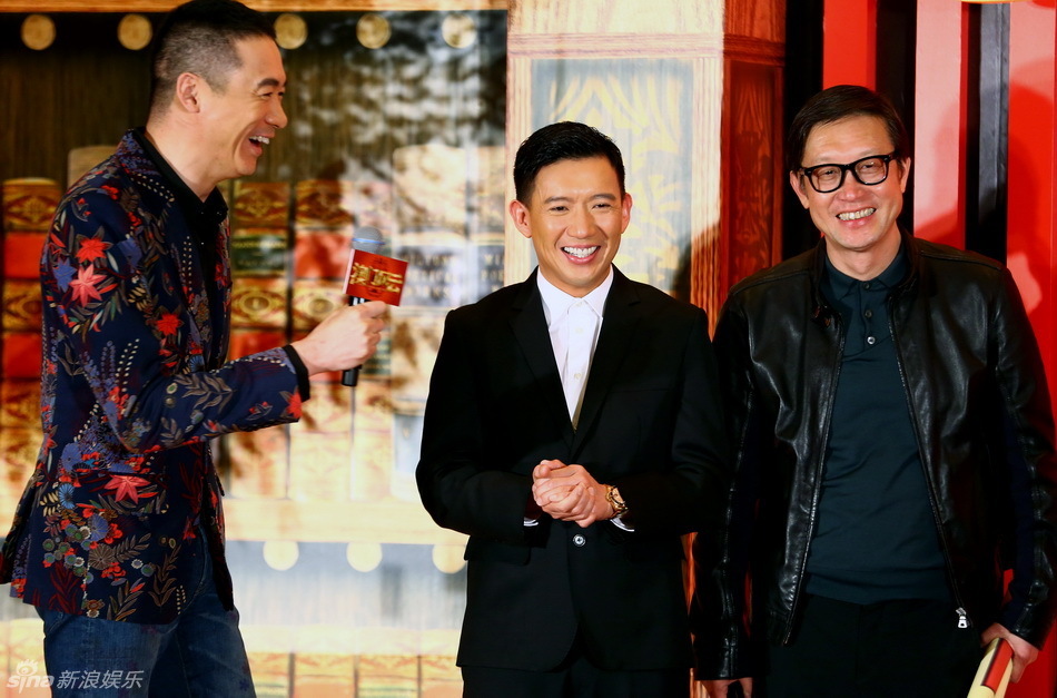 组图《澳门风云》首映 周润发夫妻恩爱_高清图集_新浪网