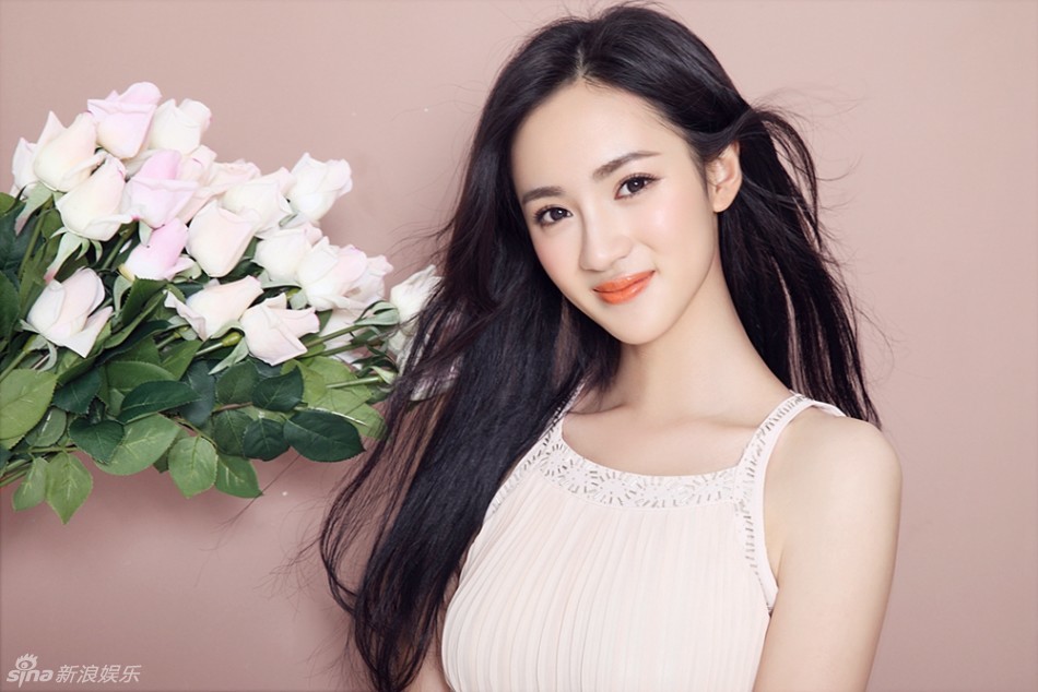 组图:陶洋浅笑嫣然拍写真 长发飘逸纱裙柔美_高清图集_新浪网