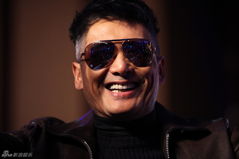 组图:周润发张家辉型男对碰 现场操练泰拳_高清图集