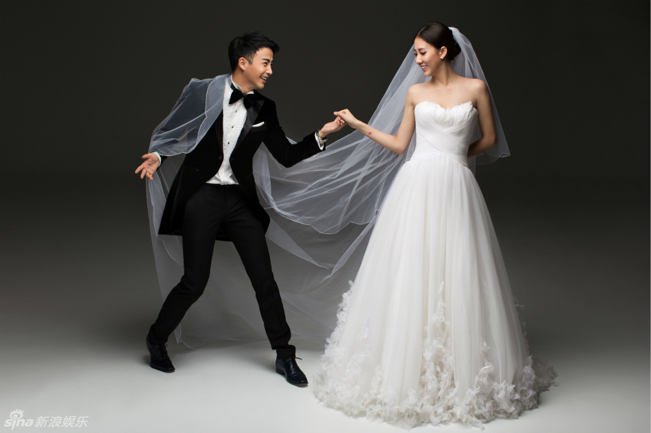 一家三口婚纱照_张馨予一家三口婚纱照