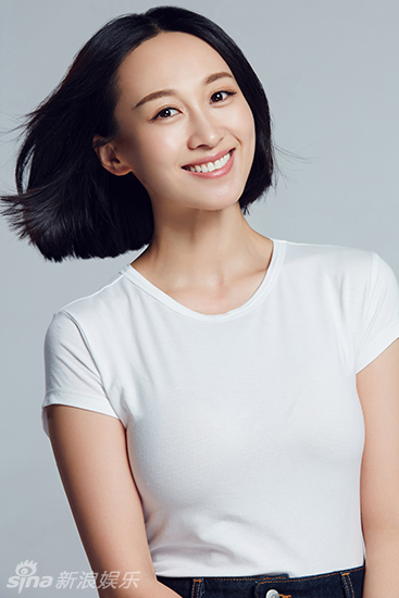 练束梅