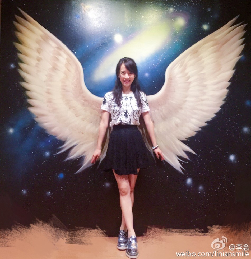 图片:李念化身天使少女心未泯 壕气表示随便花