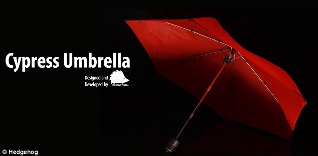 加拿大工程师发明新型防风雨伞 伞架似汽车悬挂系统组图
