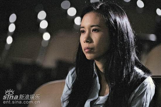 资料图片：《老港正传》剧照-莫文蔚在影院