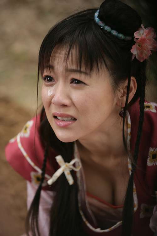 梁敏仪饰演春梅