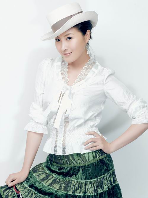 王雅捷妩媚帅气写真曝光尽显熟女风范(组图)