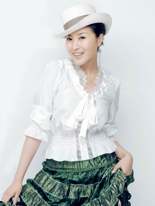 王雅捷妩媚帅气写真曝光尽显熟女风范(组图)