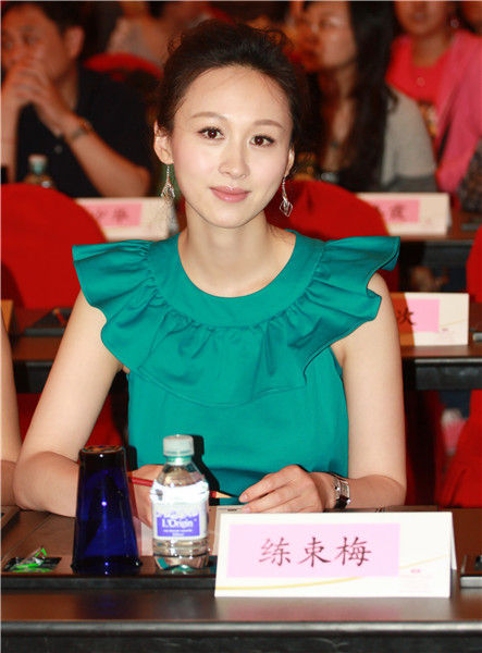 练束梅