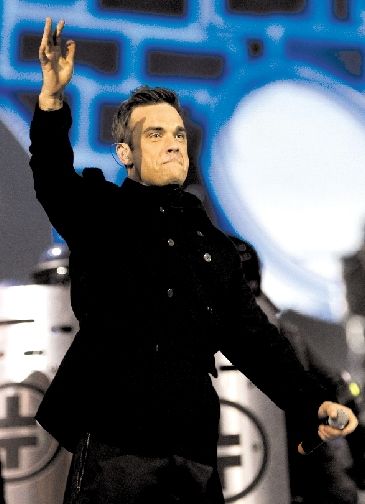 罗比·威廉姆斯回归，接招乐队首次荣膺英国最佳组合奖。 图/CFP 