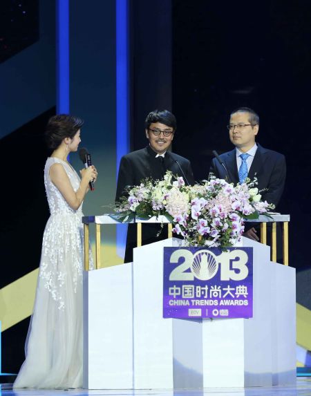 北京电视台副总编辑朱江与导演孙周作为发布人在大典舞台