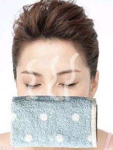 热毛巾敷脸