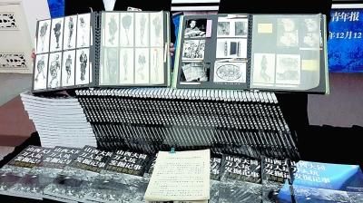 发掘资料中的手稿、相册及刚出版的《山西大同万人坑发掘记事》 发掘资料中的手稿、相册及刚出版的《山西大同万人坑发掘记事》
