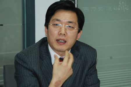 贾卧龙:经适房车库停奔驰宝马 改革要两条腿走