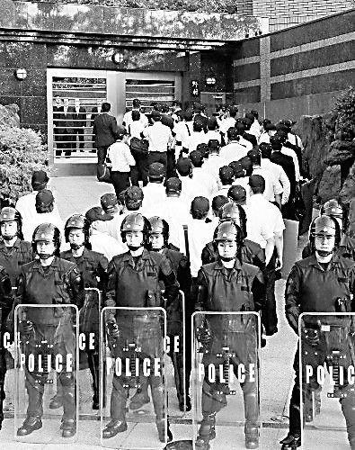 资料图:该组织总裁野村悟因涉嫌杀害原北九州市渔协负责人梶原国弘11日被福冈县警方逮捕