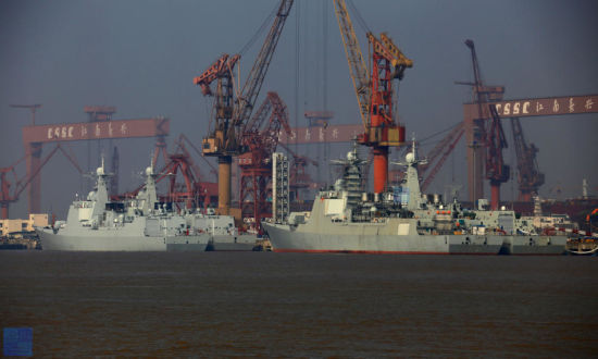 资料图:图为舾装码头上停靠的4艘052C/D驱逐舰(鸣谢:鼎盛军事 热血老年)