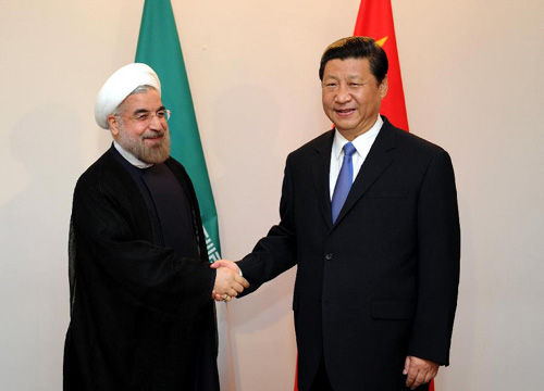 2013年9月12日,国家主席习近平在比什凯克会见伊朗总统鲁哈尼