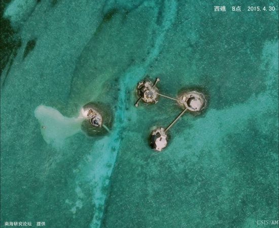 卫星图证实越南在南海岛礁填海