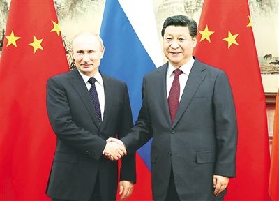 资料图:习近平与普京
