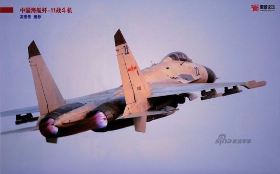 官方期刊近期刊登了一张海军最新型歼11BH(BH意为B型 海军用)战机美图,图中歼11BH战机两台国产太行发动机格外显眼。该飞机编号为81282,机身编号22,显示该机属于南海舰队航空兵。2014年8月,机身编号24的歼11BH战机奉命拦截接近我国空域的美军P-8巡逻机,外军称歼11BH绕P-8做了一个桶滚展示战机超强机动性能和飞行员的坚定态度,歼11BH战机一时名扬海内外,该机是属于海航8师的。 官方期刊近期刊登了一张海军最新型歼11BH(BH意为B型 海军用)战机美图,图中歼11BH战机两台国产太行发动机格外显眼。该飞机编号为81282,机身编号22,显示该机属于南海舰队航空兵。2014年8月,机身编号24的歼11BH战机奉命拦截接近我国空域的美军P-8巡逻机,外军称歼11BH绕P-8做了一个桶滚展示战机超强机动性能和飞行员的坚定态度,歼11BH战机一时名扬海内外,该机是属于海航8师的。